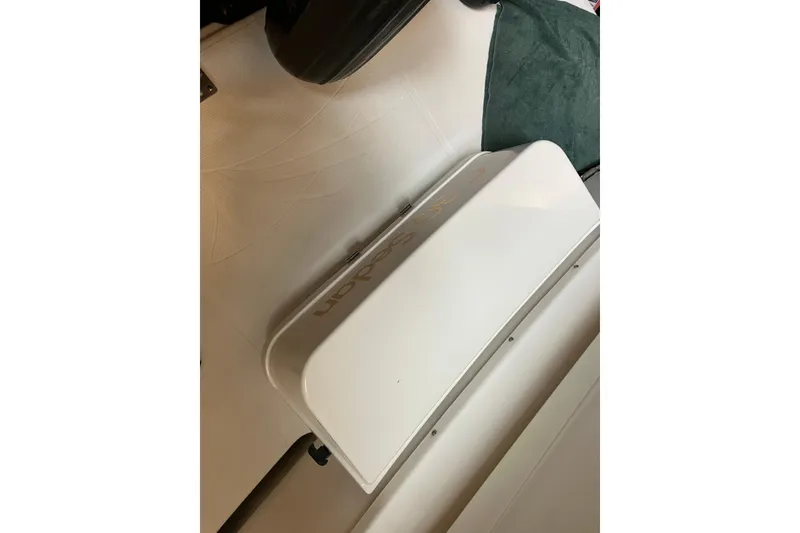 Slide: The Image of 2017 Cutwater C-30 Sedan boat interior detail, featuring sleek white surfaces. - 104