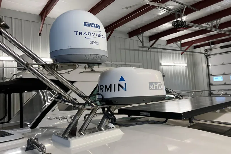 Slide: The Image of 2017 Cutwater C-30 Sedan with TracVision and Garmin xHD radar in a garage. - 93