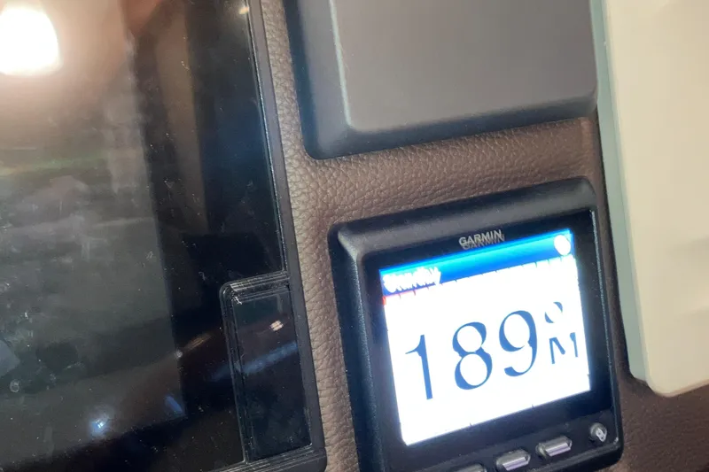 Slide: The Image of Garmin display showing 189 on 2017 Cutwater C-30 Sedan dashboard. - 58