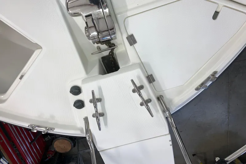 Slide: The Image of 2017 Cutwater C-30 Sedan boat deck with cleats and anchor chain. - 96