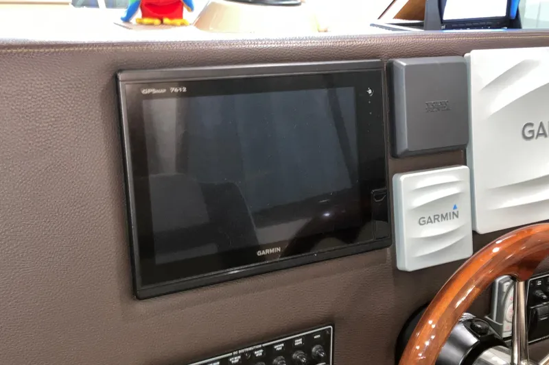Slide: The Image of Garmin GPS display on 2017 Cutwater C-30 Sedan boat dashboard. - 57