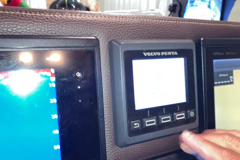 Slide: The Image of Control panel of a 2017 Cutwater C-30 Sedan with Volvo Penta display. - 56
