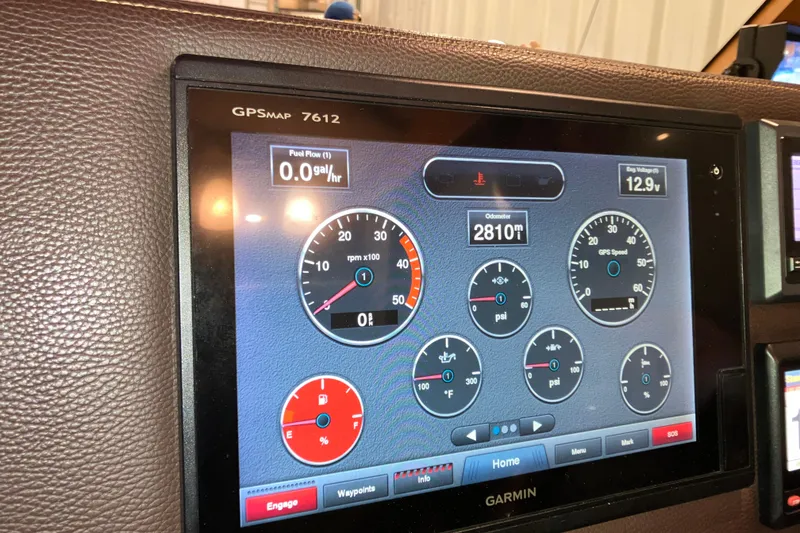 Slide: The Image of Garmin GPS display on 2017 Cutwater C-30 Sedan showing engine metrics and odometer. - 61