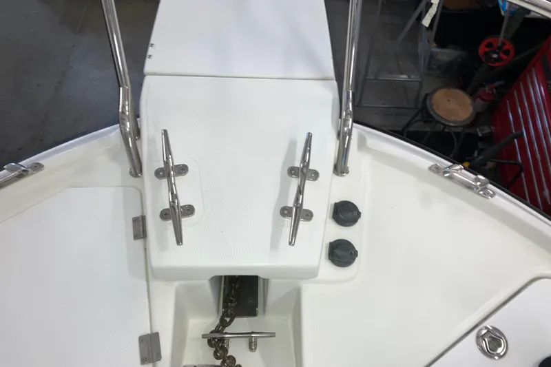 Slide: The Image of 2017 Cutwater C-30 Sedan boat deck with cleats and anchor chain. - 100