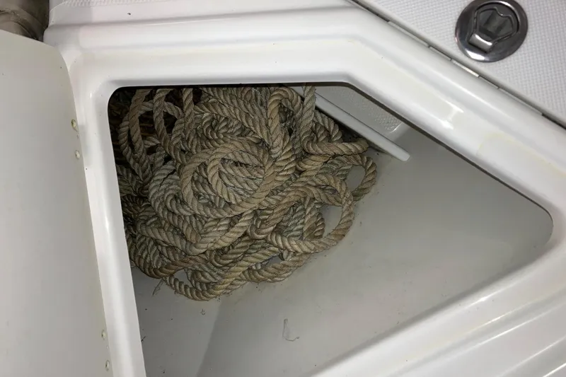 Slide: The Image of Rope storage compartment in 2017 Cutwater C-30 Sedan boat. - 103