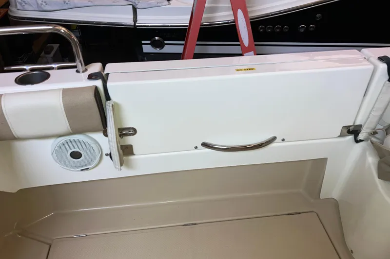 Slide: The Image of 2017 Cutwater C-30 Sedan boat interior with speaker and seating area. - 18