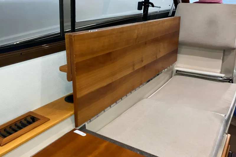 Slide: The Image of Interior of 2017 Cutwater C-30 Sedan with wooden panel and cushioned seating. - 39