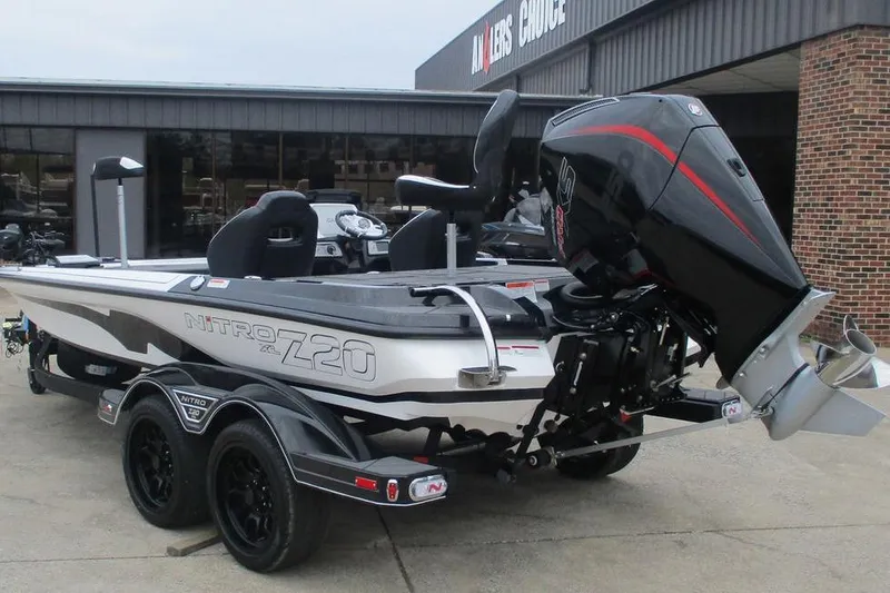 Slide: The Image of 2026 Nitro Z20 XL Pro boat with powerful outboard motor, parked outside dealership. - 3