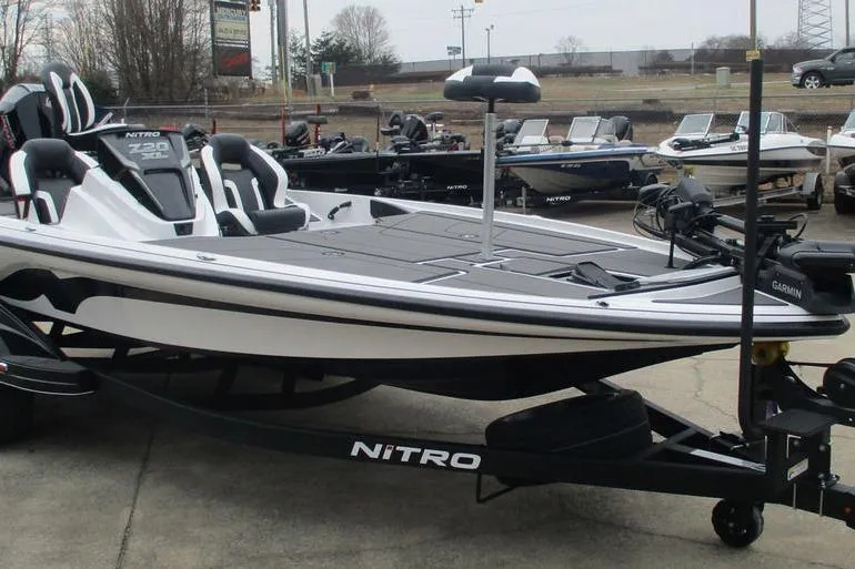 Slide: The Image of 2026 Nitro Z20 XL Pro fishing boat on trailer, displayed outdoors. - 6
