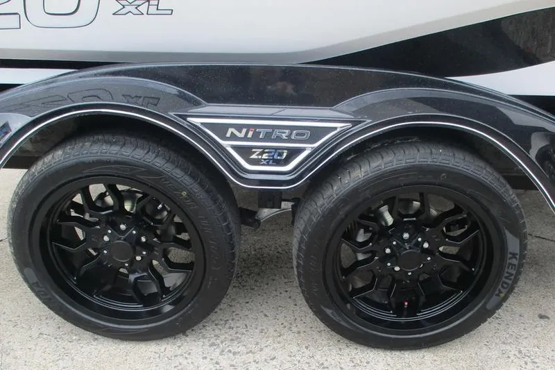 Slide: The Image of 2026 Nitro Z20 XL Pro trailer with black wheels and sleek design. - 8