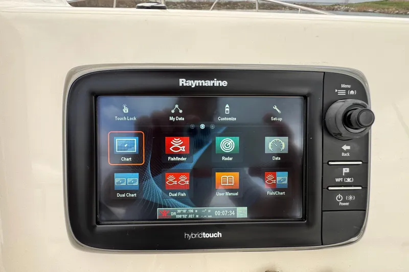 Slide: The Image of Raymarine HybridTouch display on 2016 Boston Whaler 210 Montauk boat dashboard. - 15