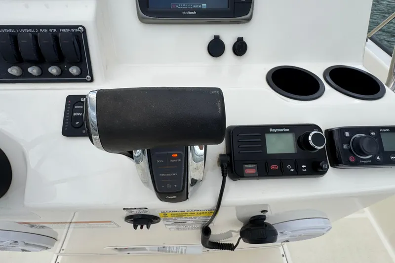 Slide: The Image of Control panel of a 2016 Boston Whaler 210 Montauk boat with navigation equipment. - 20