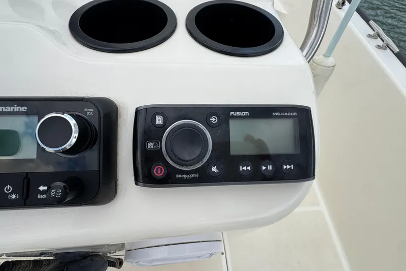 Slide: The Image of Control panel of a 2016 Boston Whaler 210 Montauk boat with marine audio system. - 21