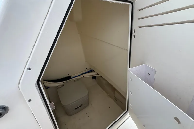 Slide: The Image of Interior storage compartment of a 2016 Boston Whaler 210 Montauk boat. - 22