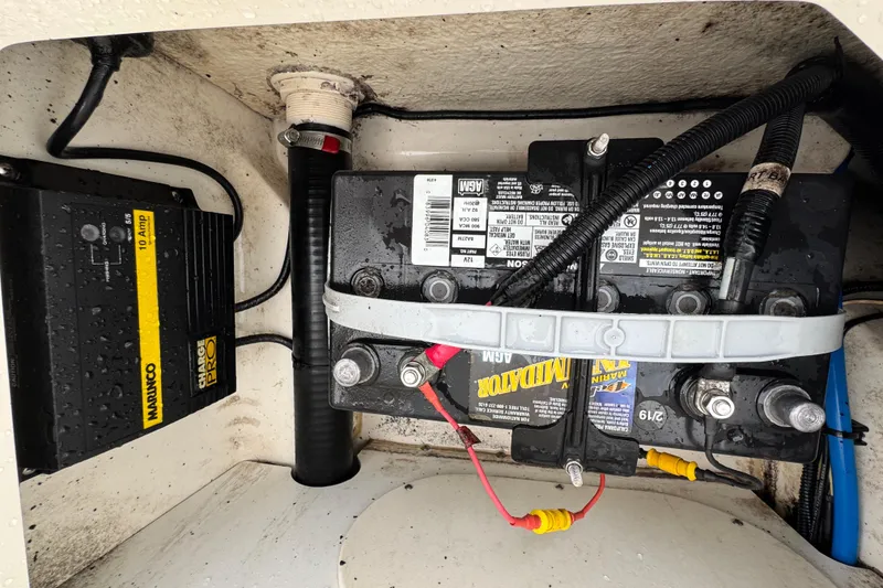 Slide: The Image of Battery and charger setup in a 2016 Boston Whaler 210 Montauk boat. - 25