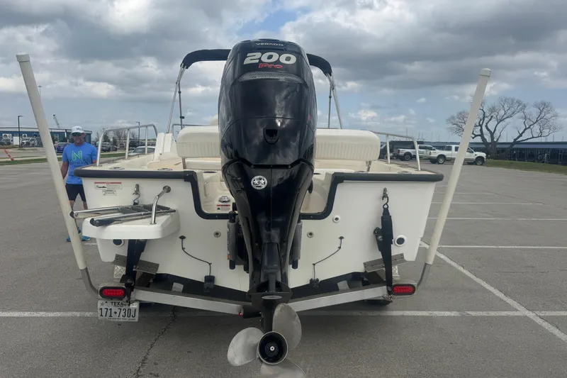 Slide: The Image of 2016 Boston Whaler 210 Montauk boat with 200 Pro motor in parking lot. - 9
