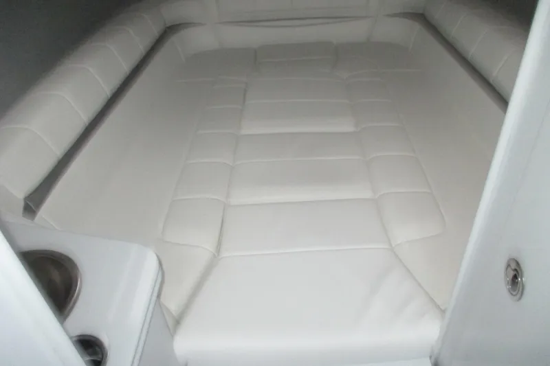 Slide: The Image of Interior cabin of 2005 Formula 353 FASTech boat with white cushioned seating. - 20
