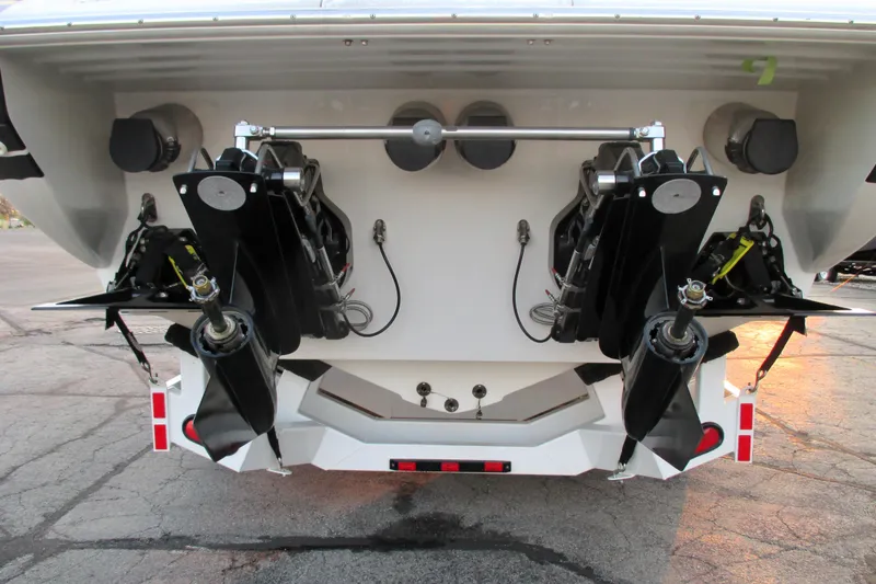 Slide: The Image of Rear view of a 2005 Formula 353 FASTech boat showing dual outboard motors. - 7
