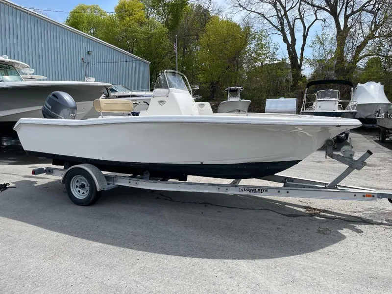 Slide: The Image of 2016 Tidewater 198 Center Console boat on trailer in outdoor storage area. - 14