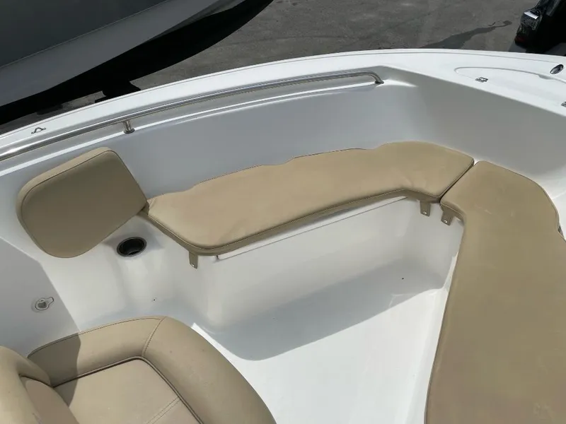 Slide: The Image of 2016 Tidewater 198 Center Console boat with beige seating and white interior. - 17
