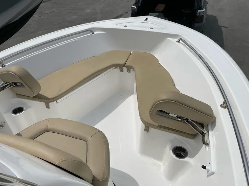 Slide: The Image of 2016 Tidewater 198 Center Console boat with beige seating and white deck. - 18