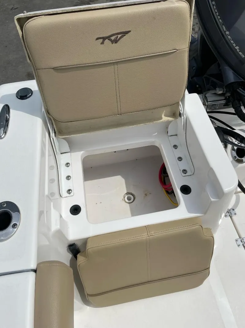 Slide: The Image of 2016 Tidewater 198 Center Console boat seat with storage compartment. - 22