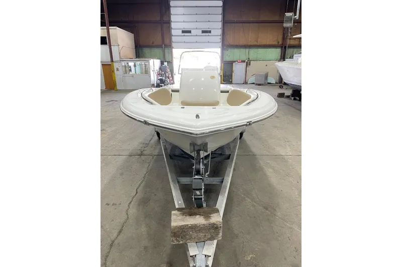 Slide: The Image of 2016 Tidewater 198 CC Adventure boat in warehouse. - 3