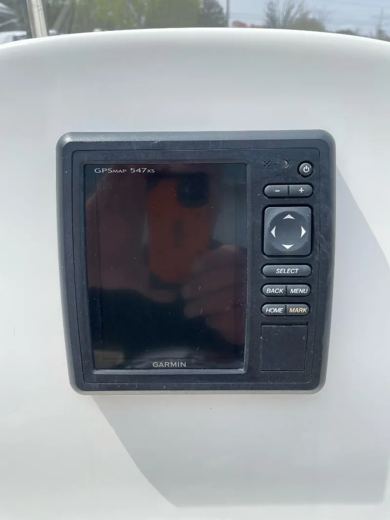 Slide: The Image of Garmin GPS device on 2016 Tidewater 198 Center Console boat dashboard. - 30