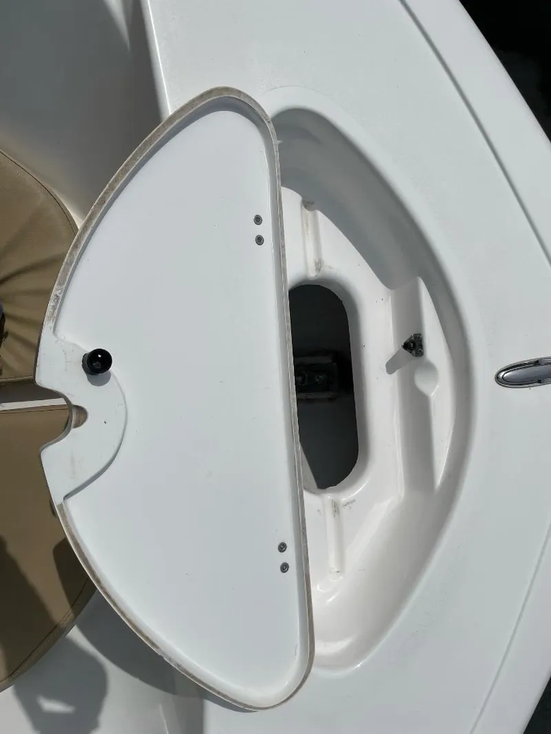 Slide: The Image of 2016 Tidewater 198 Center Console boat storage compartment detail. - 35