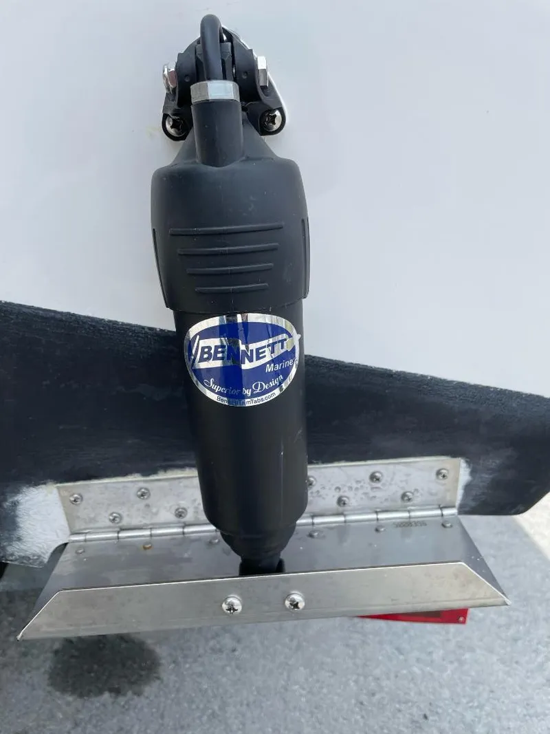 Slide: The Image of Bennett trim tab on 2016 Tidewater 198 Center Console boat. - 37