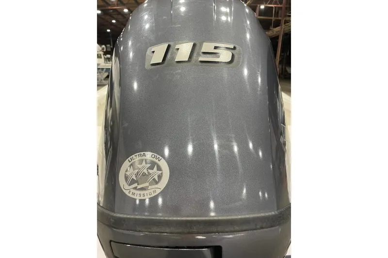 Slide: The Image of Outboard motor with 115 HP and Ultra-Low Emission logo. - 44