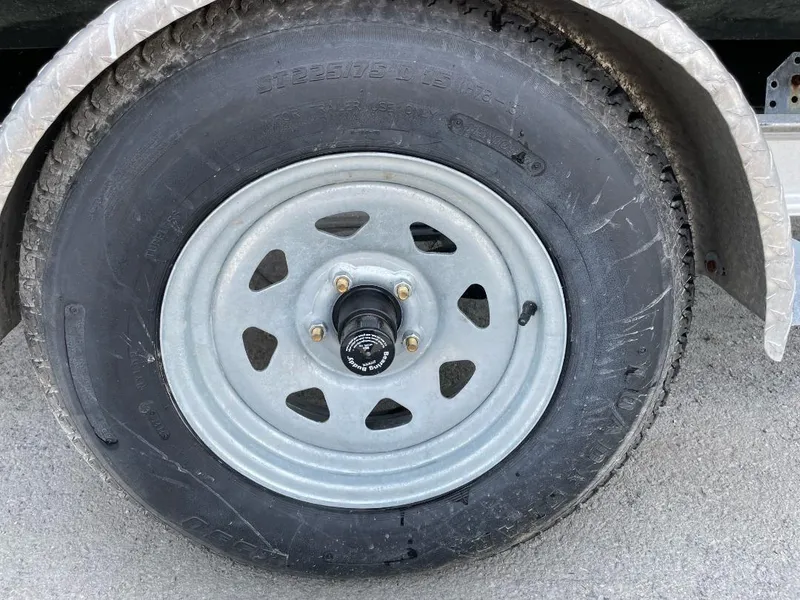 Slide: The Image of Trailer wheel for 2016 Tidewater 198 Center Console boat. - 52