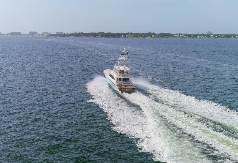 Slide: The Image of Viking 70 Convertible yacht cruising on open water, 2015 model. - 25