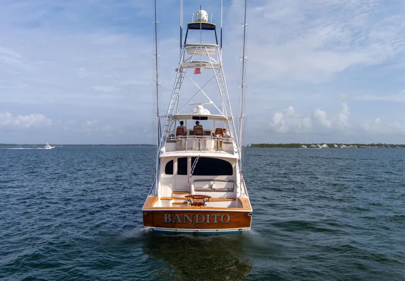 Slide: The Image of Viking 70 Convertible 2015 yacht "Bandito" on open water, rear view. - 8