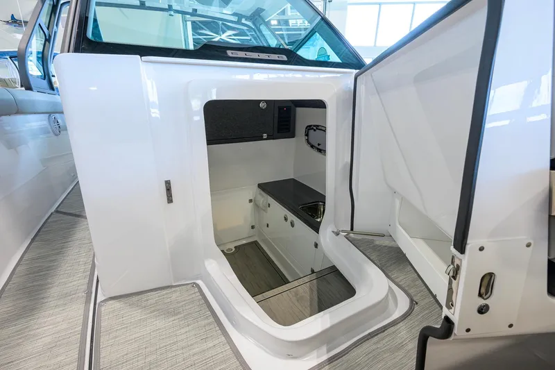 Slide: The Image of 2026 Monterey Elite 30 OB boat interior cabin with sleek design and modern amenities. - 21