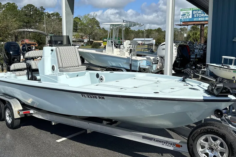 The Image of 2017 Yellowfin 24 Bay CE boat on trailer, parked outdoors at a dealership. - 0
