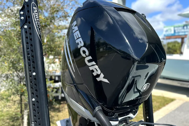 Slide: The Image of Mercury outboard engine on 2017 Yellowfin 24 Bay CE boat, sunny day background. - 15
