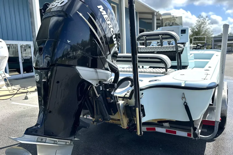 Slide: The Image of 2017 Yellowfin 24 Bay CE boat with Mercury 250 engine, parked on a trailer. - 16