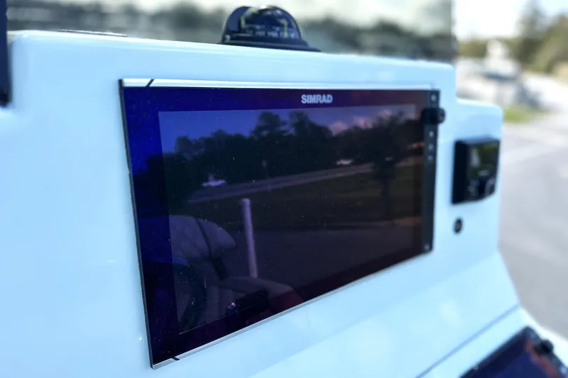 Slide: The Image of Simrad display on 2017 Yellowfin 24 Bay CE boat dashboard. - 3