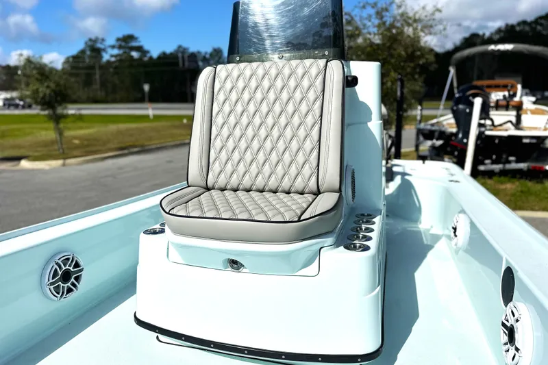 Slide: The Image of 2017 Yellowfin 24 Bay CE boat with diamond-stitched seat and sleek design. - 5