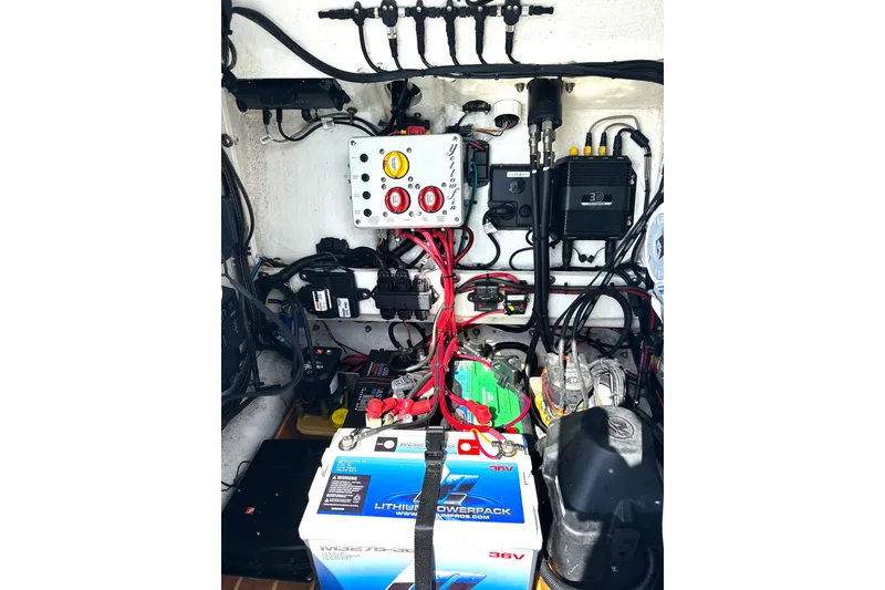 Slide: The Image of 2017 Yellowfin 24 Bay CE boat electrical system with lithium battery and wiring. - 9