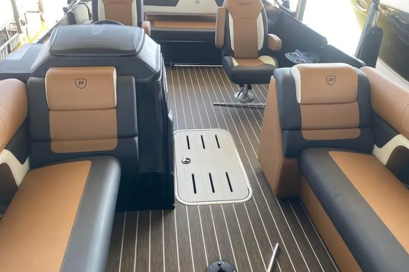 Slide: The Image of Luxurious interior of 2025 Premier Solaris 230RL boat with stylish seating and modern design. - 2