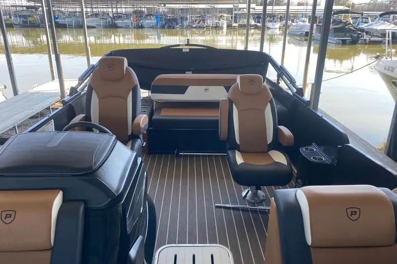 Slide: The Image of 2025 Premier Solaris 230RL boat interior with luxurious seating and modern design. - 4