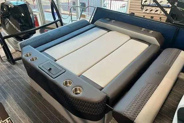 Slide: The Image of 2025 Premier Solaris 230RL boat with luxurious lounging area. - 9