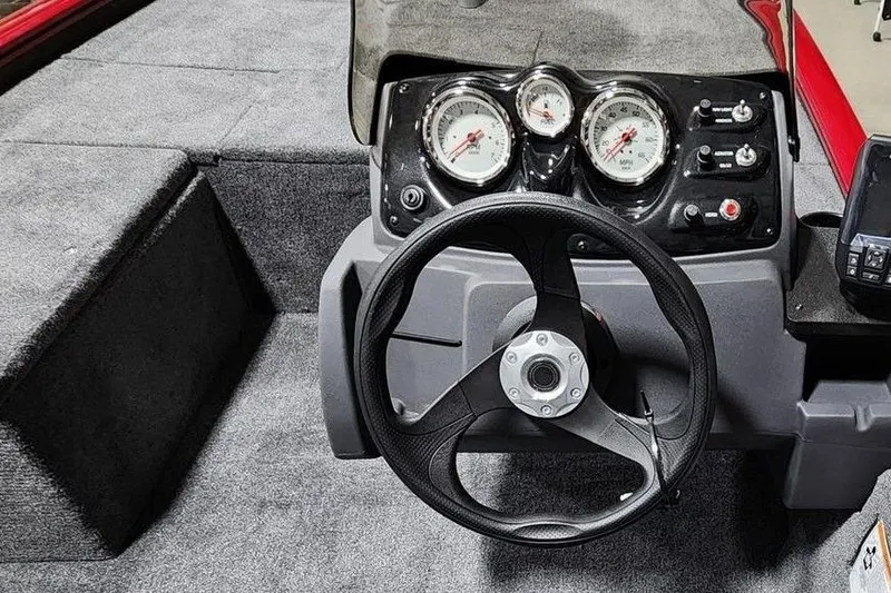 Slide: The Image of Steering console of 2026 Tracker Pro 170 boat with gauges and controls. - 4
