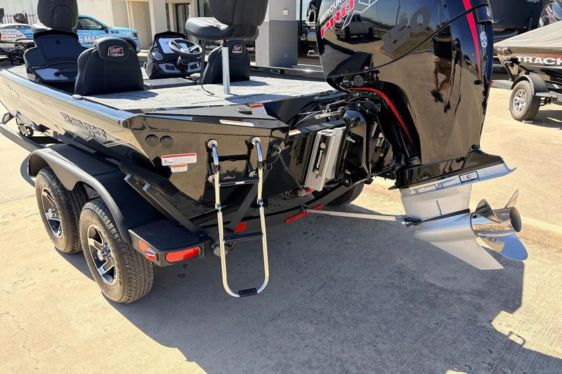 Slide: The Image of 2026 Ranger RT198P boat with Mercury Pro XS engine, dual axle trailer, and boarding ladder. - 10