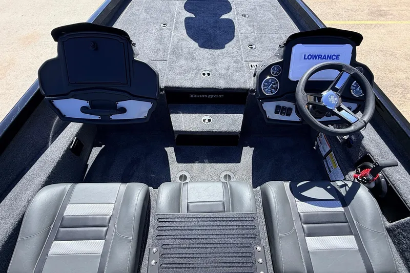 Slide: The Image of Interior of 2026 Ranger RT198P boat with steering wheel and dual seats. - 26