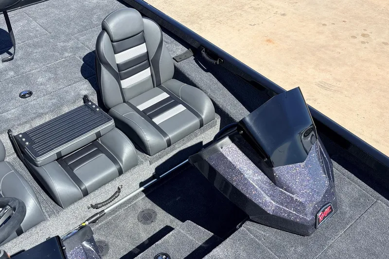 Slide: The Image of 2026 Ranger RT198P boat interior with sleek gray seating and modern dashboard design. - 31