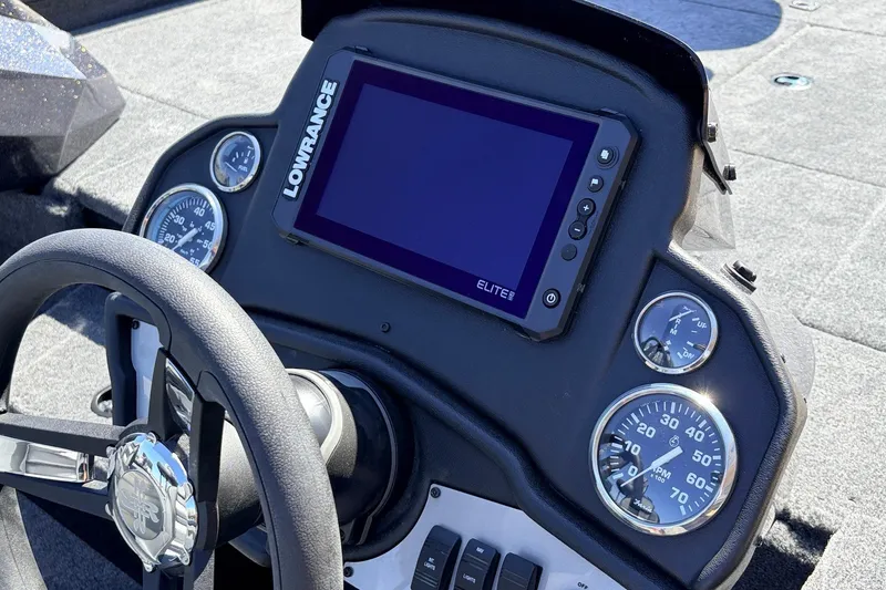 Slide: The Image of 2026 Ranger RT198P boat dashboard with Lowrance Elite display and gauges. - 37