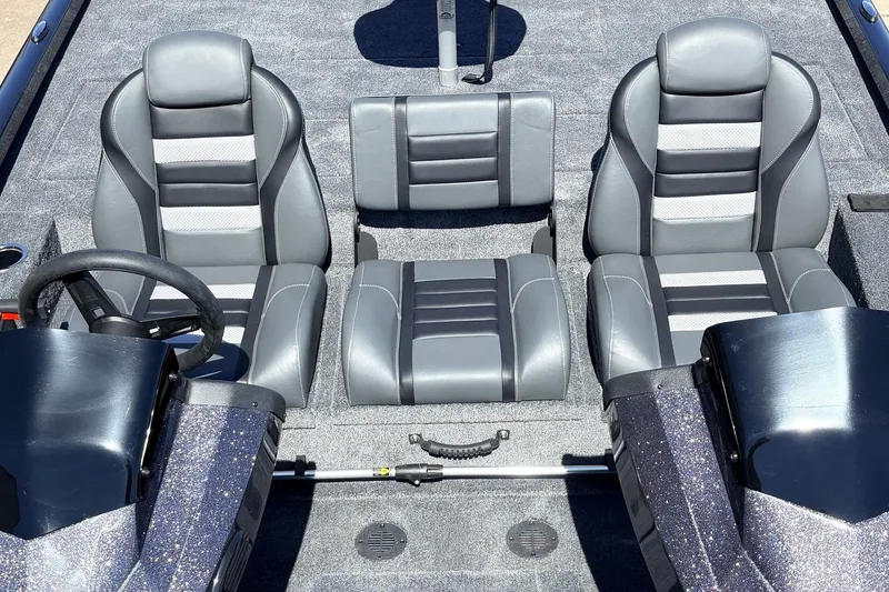 Slide: The Image of 2026 Ranger RT198P boat interior with gray seating and steering wheel. - 38